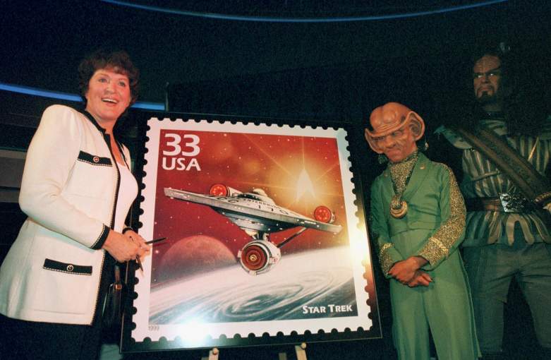 Majel Barrett (L), wife of late "Star Trek" creator Gene Roddenberry, unveils the new "STAR TREK" postal stamp