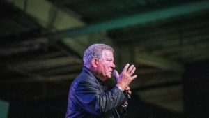 William Shatner speaks from the stage at the second edition of the multi-genre entertainment comic and fan convention 'Comic Con Africa' in Johannesburg on September 21, 2019