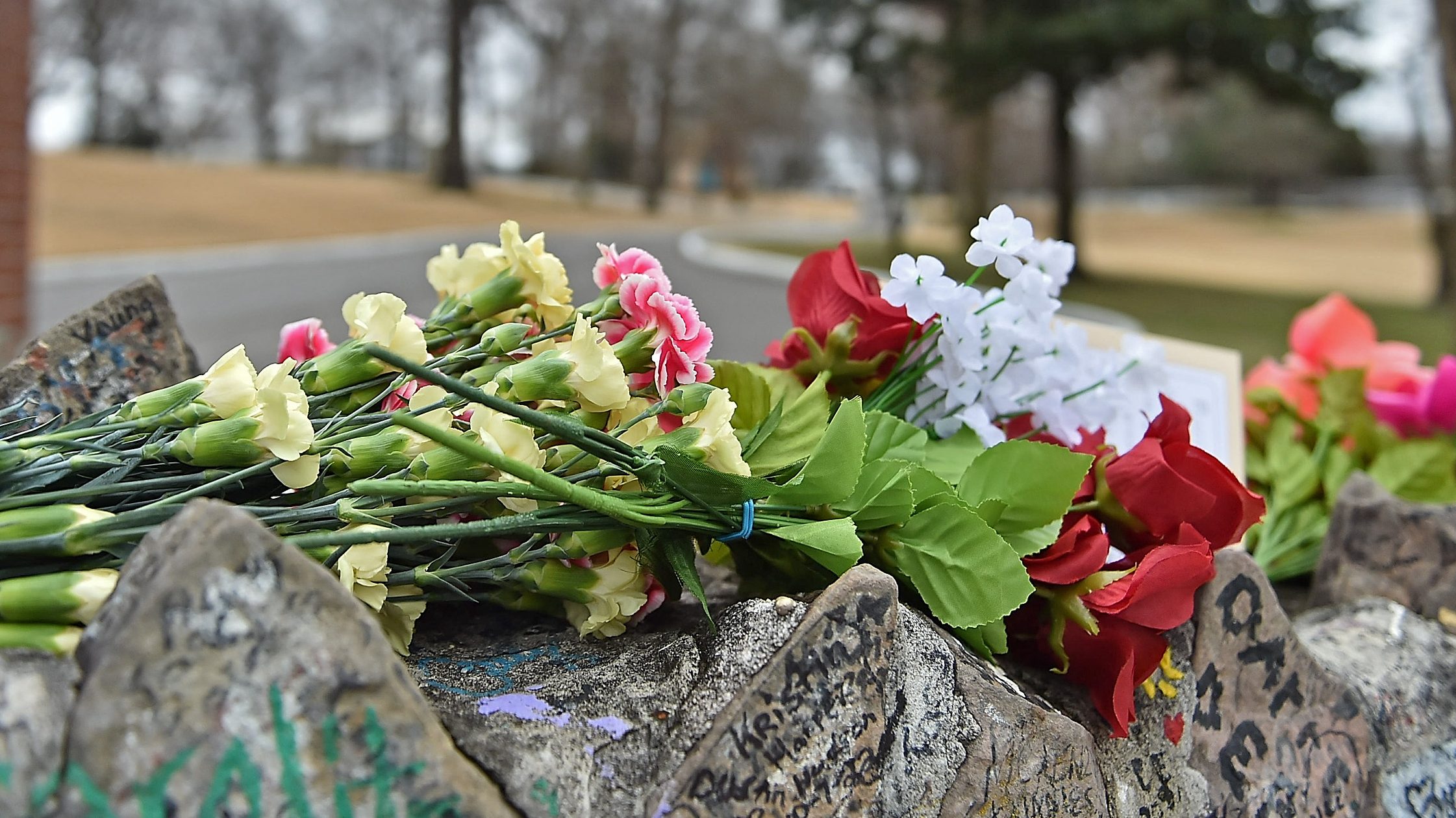 Flowers left by fans outside Graceland.