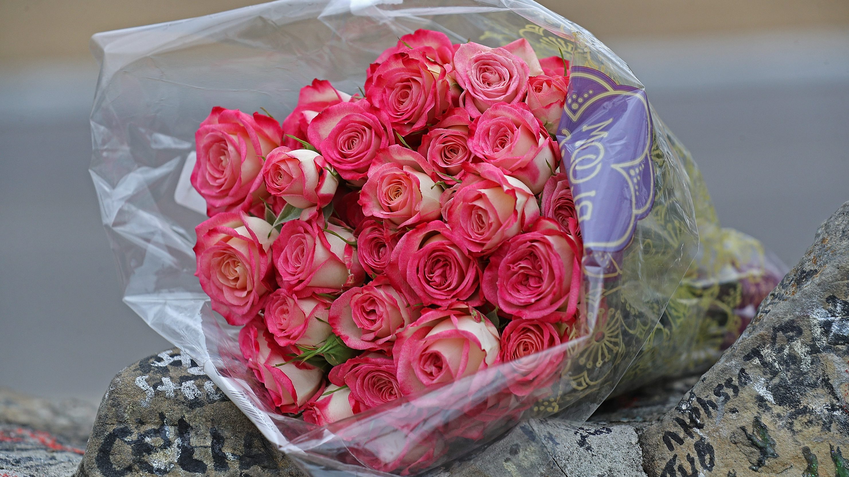 Flowers left by fans outside Graceland.