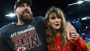 Taylor Swift and Travis Kelce celebrating the 2024 AFC Championship.