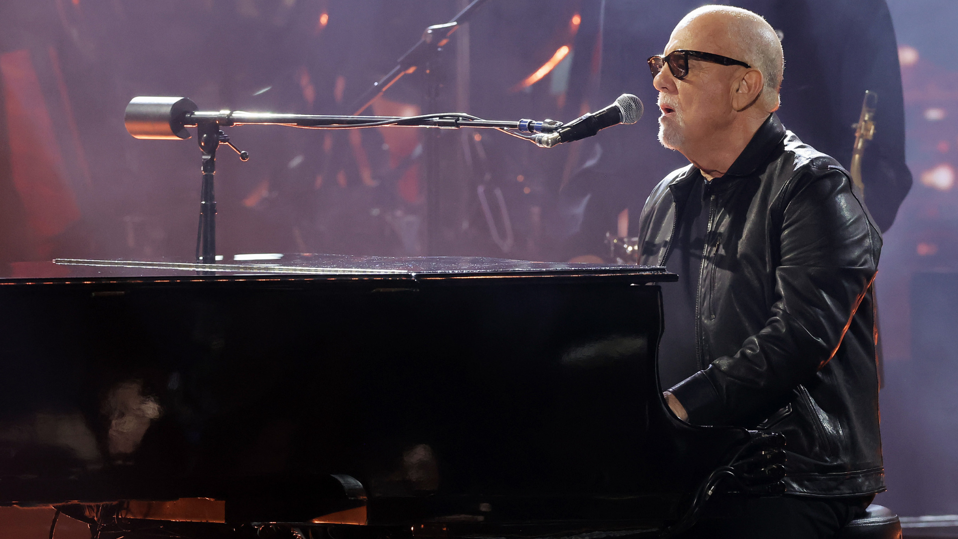 Billy Joel performs onstage during the 66th GRAMMY Awards