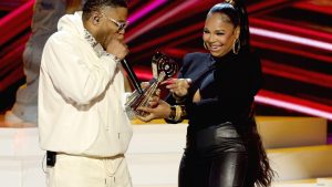 Nelly accepts the Landmark Award from Ashanti onstage at the 2025 iHeartRadio Music Awards a on March 17, 2025.