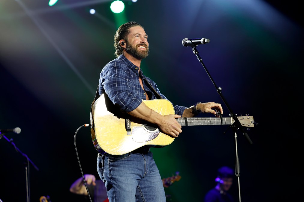 Riley Green playing guitar