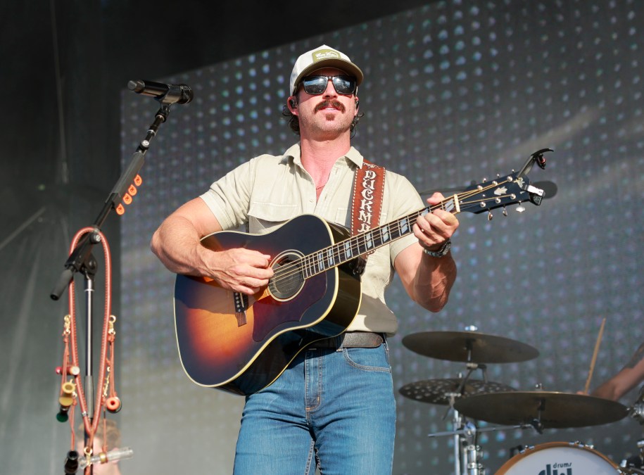 Riley Green playing guitar