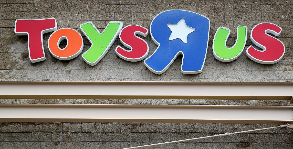 The Toys 'R' Us logo is displayed on the exterior of a store on March 15, 2018 in Emeryville, California.