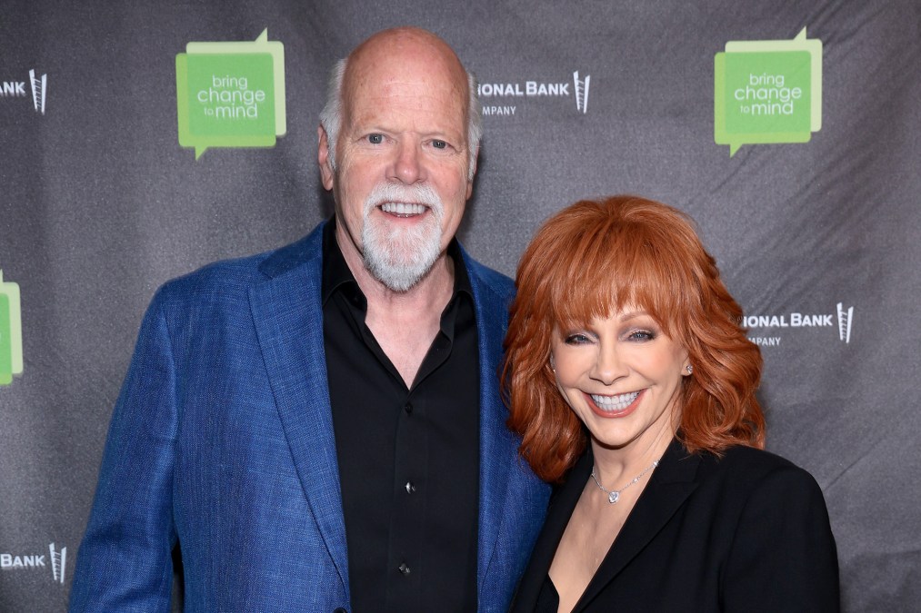 Reba McEntire & Rex Linn posing together