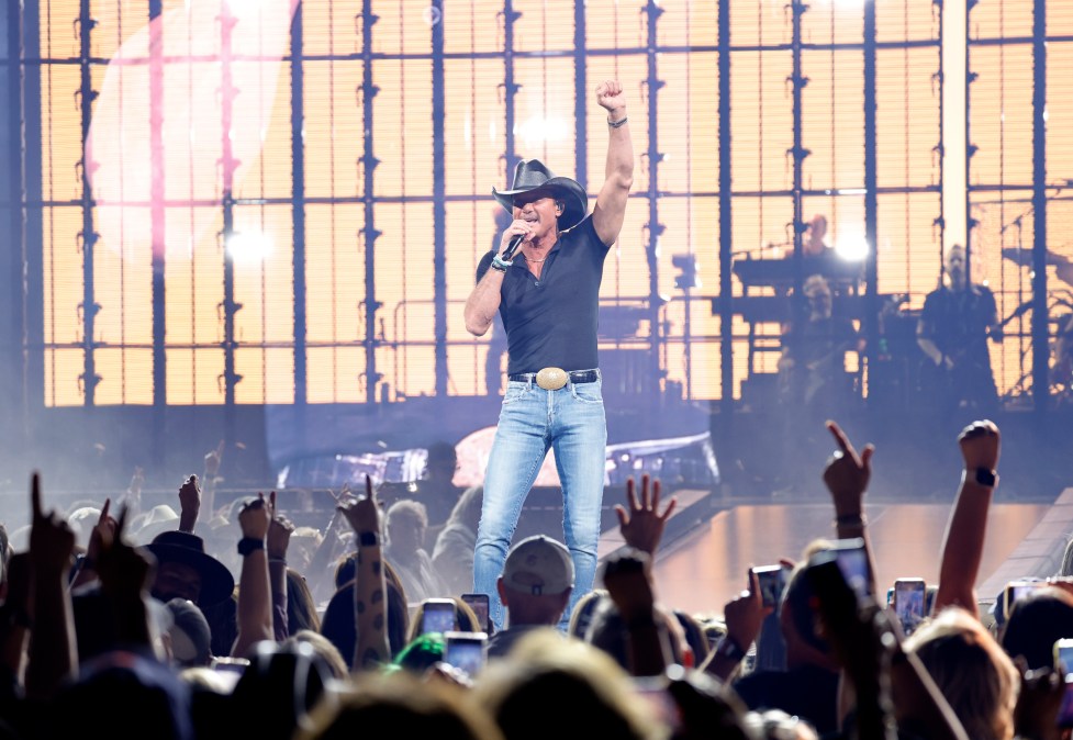 Tim McGraw performing on stage