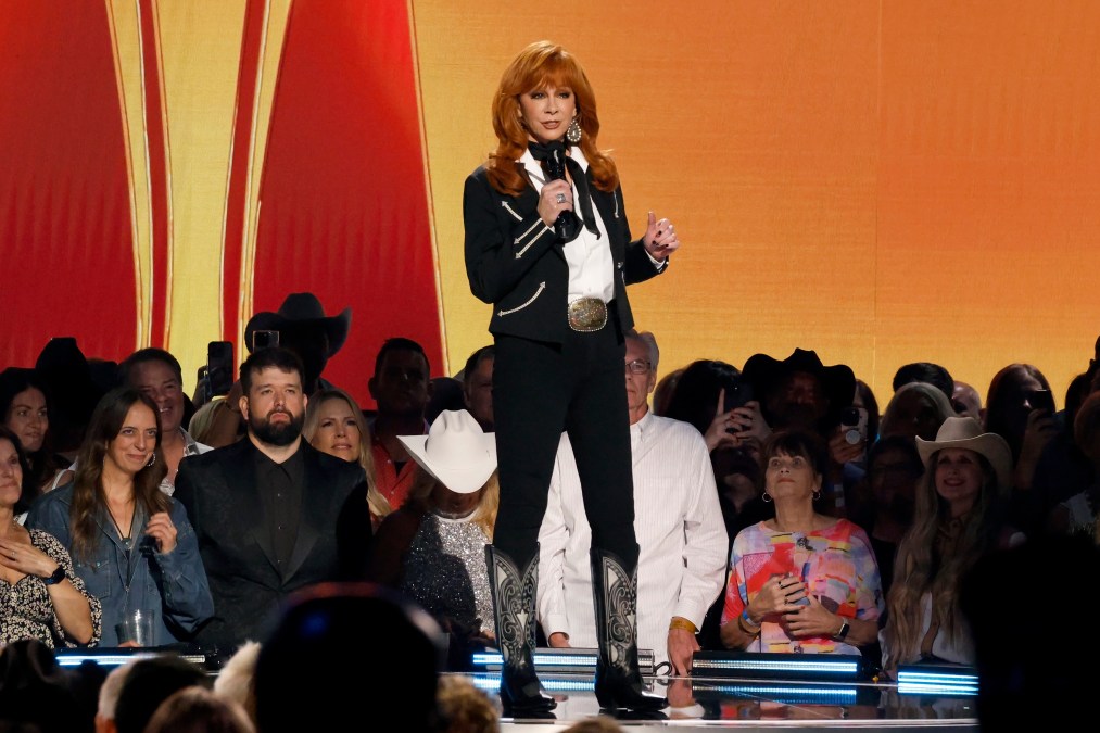 Reba McEntire performing on stage
