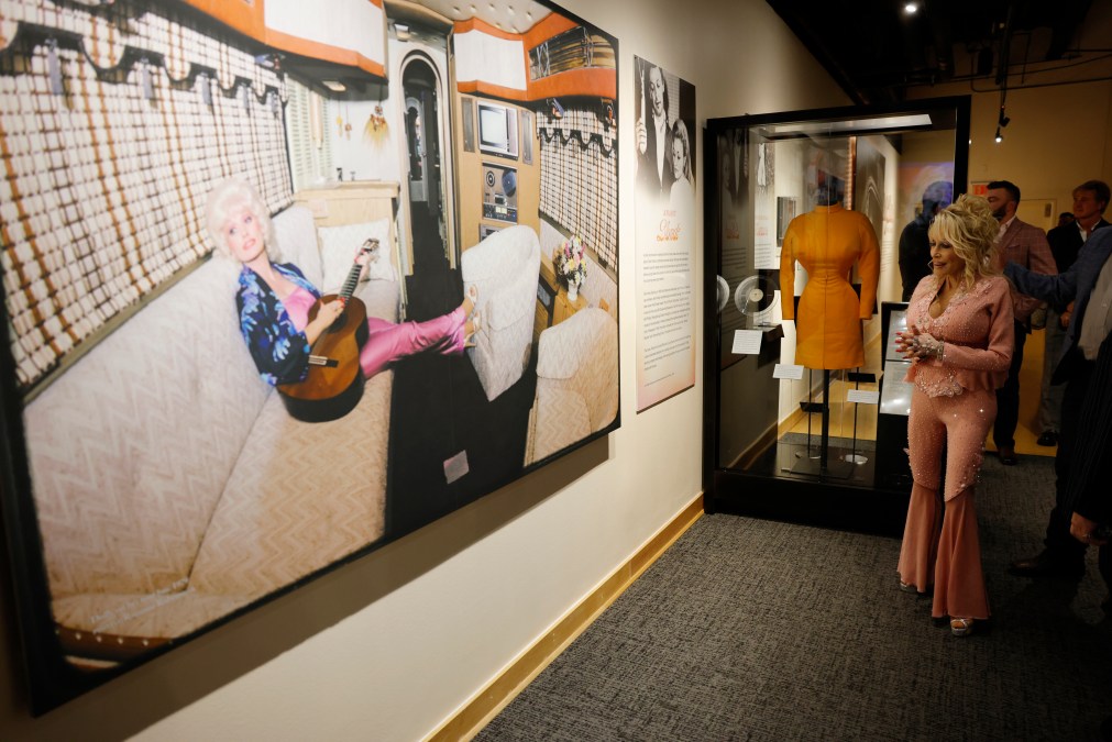 Dolly Parton views exhibit 'Dolly Parton: Journey of a Seeker' at Country Music Hall of Fame and Museum