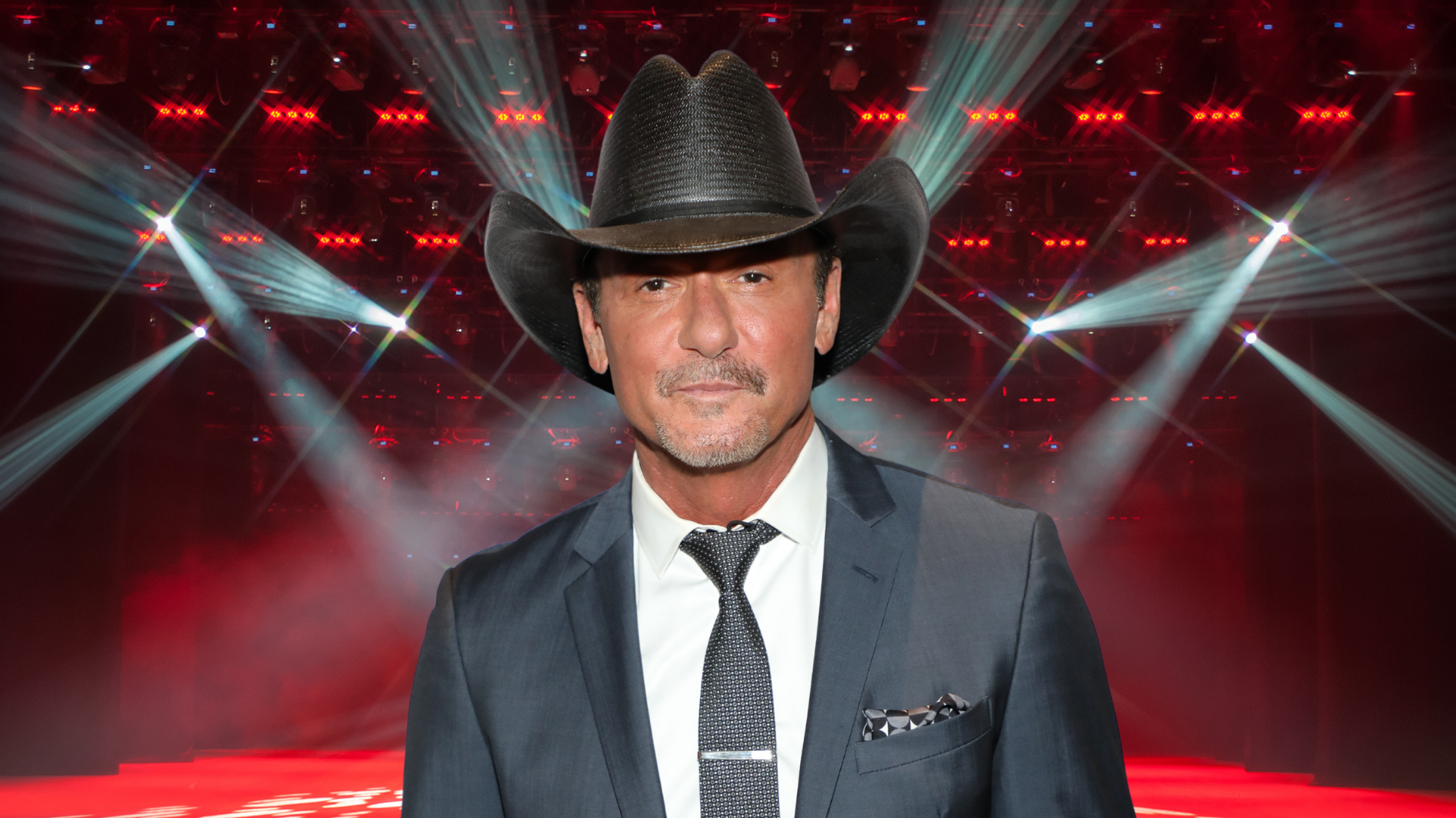 Tim McGraw posing on stage