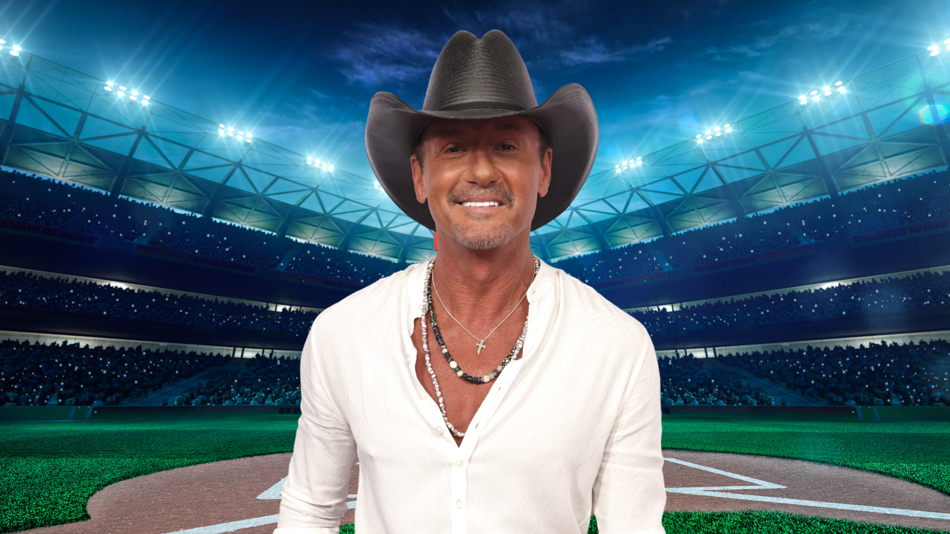 Tim McGraw smiling on a baseball field