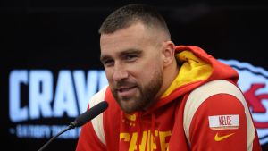 Travis Kelce talks to the media during a Kansas City press conference