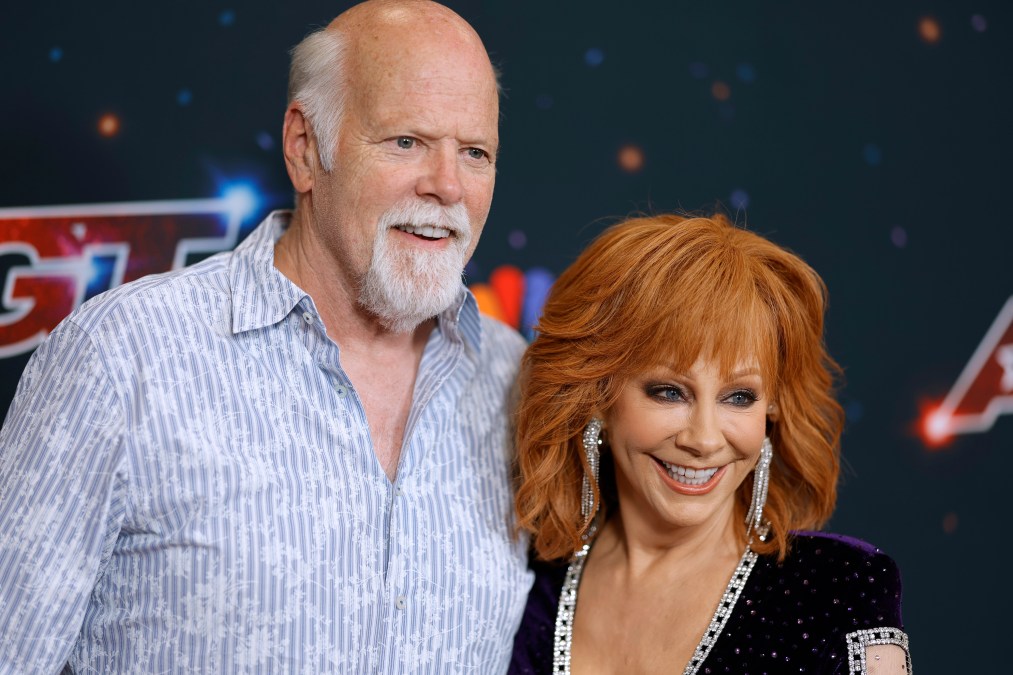 Rex Linn and Reba McEntire posing together.