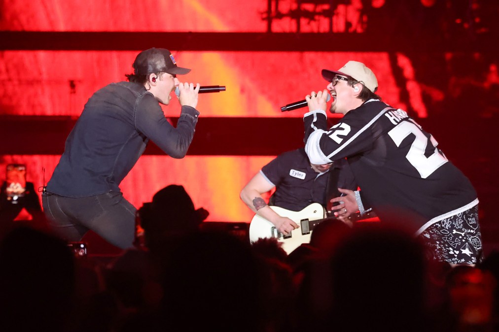Morgan Wallen and HARDY singing together