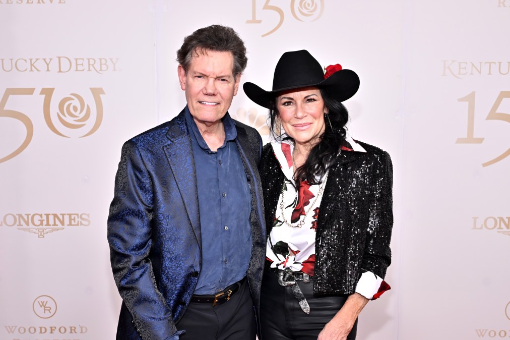 Randy Travis and Mary Travis posing together