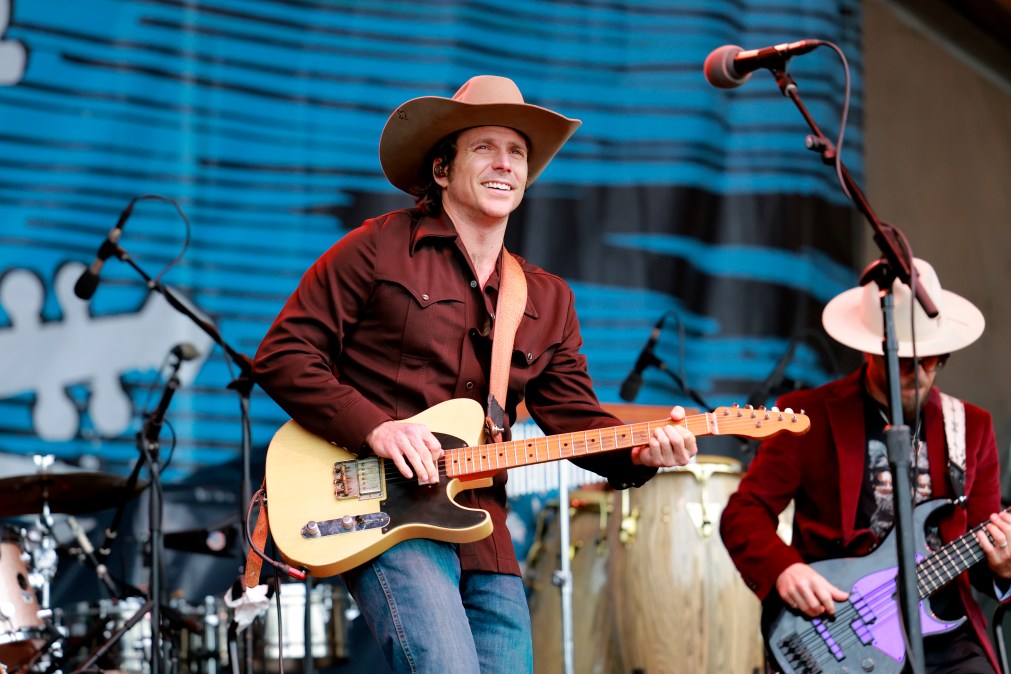Lukas Nelson performing on stage