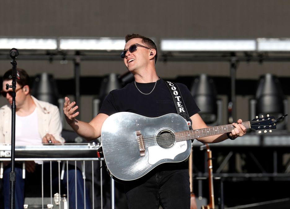 Scotty McCreery performing on stage