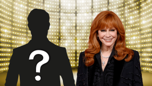 Reba McEntire posing with a mystery man.