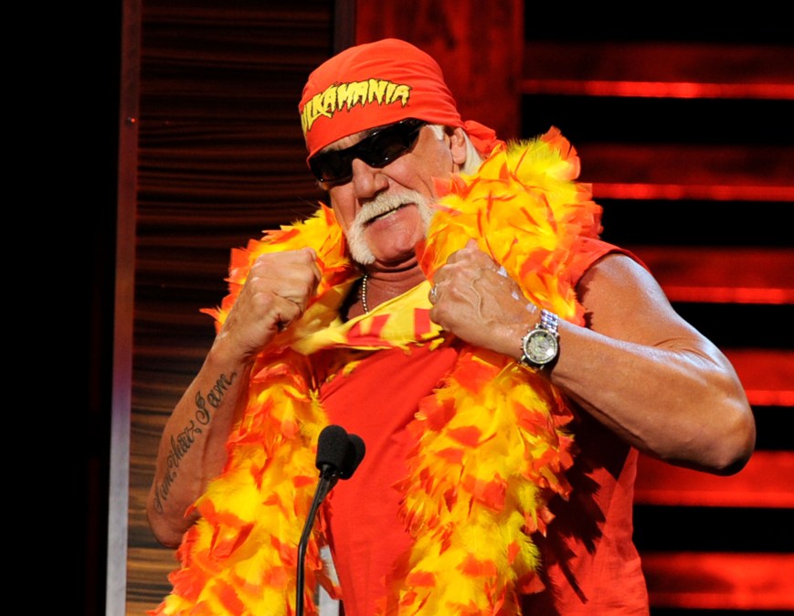Wrestler Hulk Hogan wearing red and yellow boa