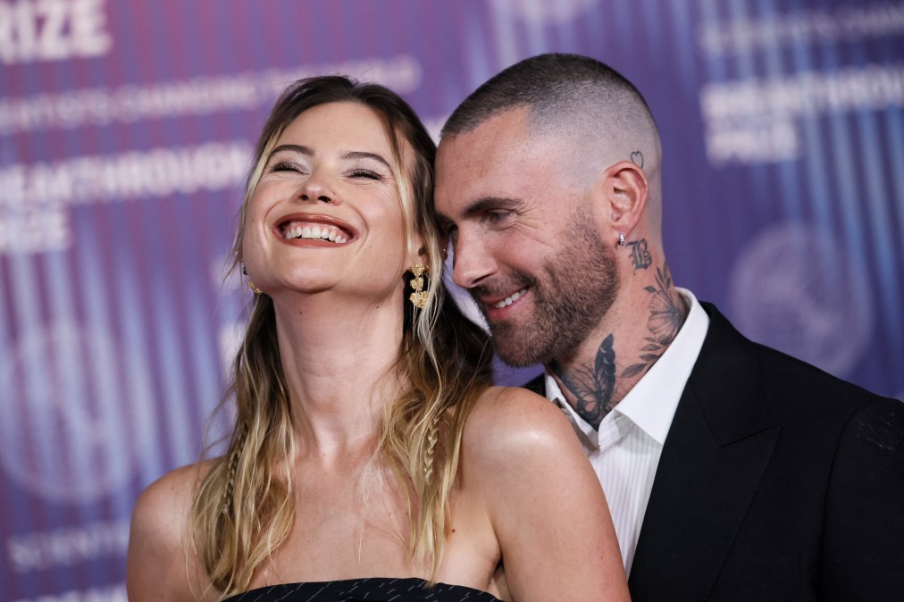 Namibian model Behati Prinsloo (L) and US singer Adam Levine 