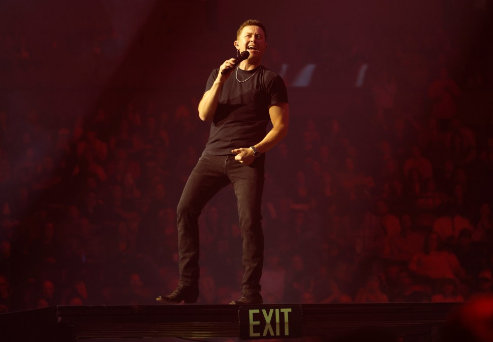 Scotty McCreery singing on stage
