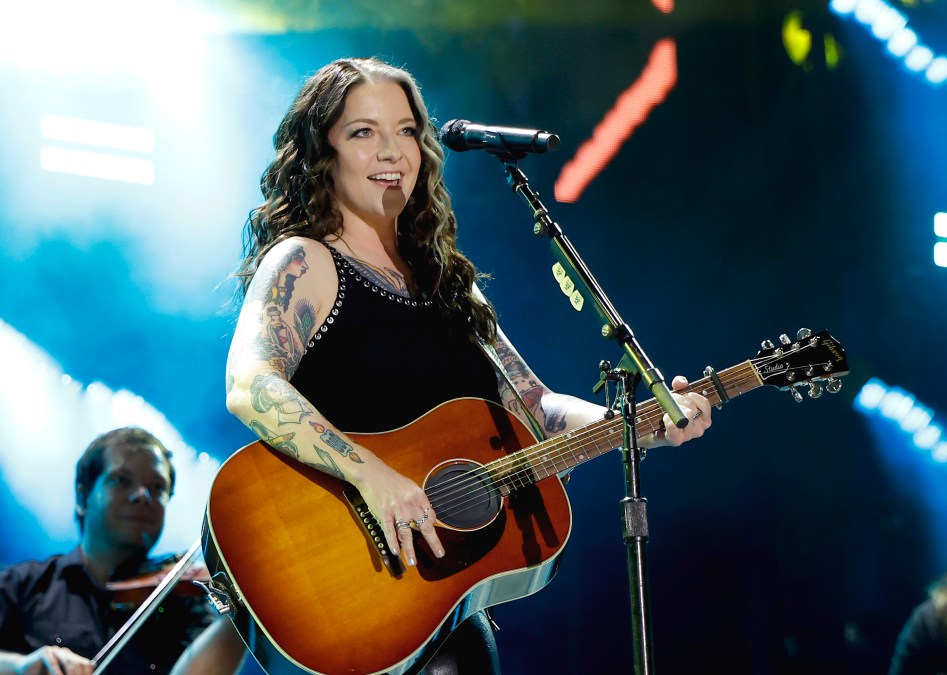 Ashley McBryde playing guitar