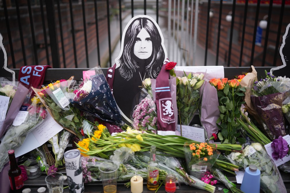 Flowers, candles, drinks and messages in memory of Ozzy Osbourne