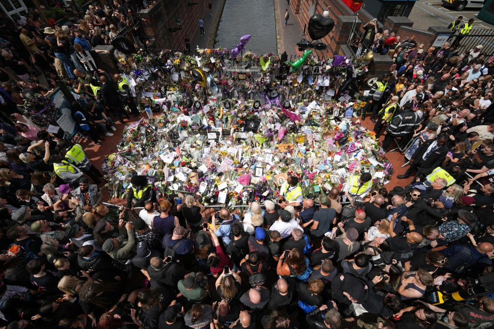  fans view tributes to the late Ozzy Osbourne