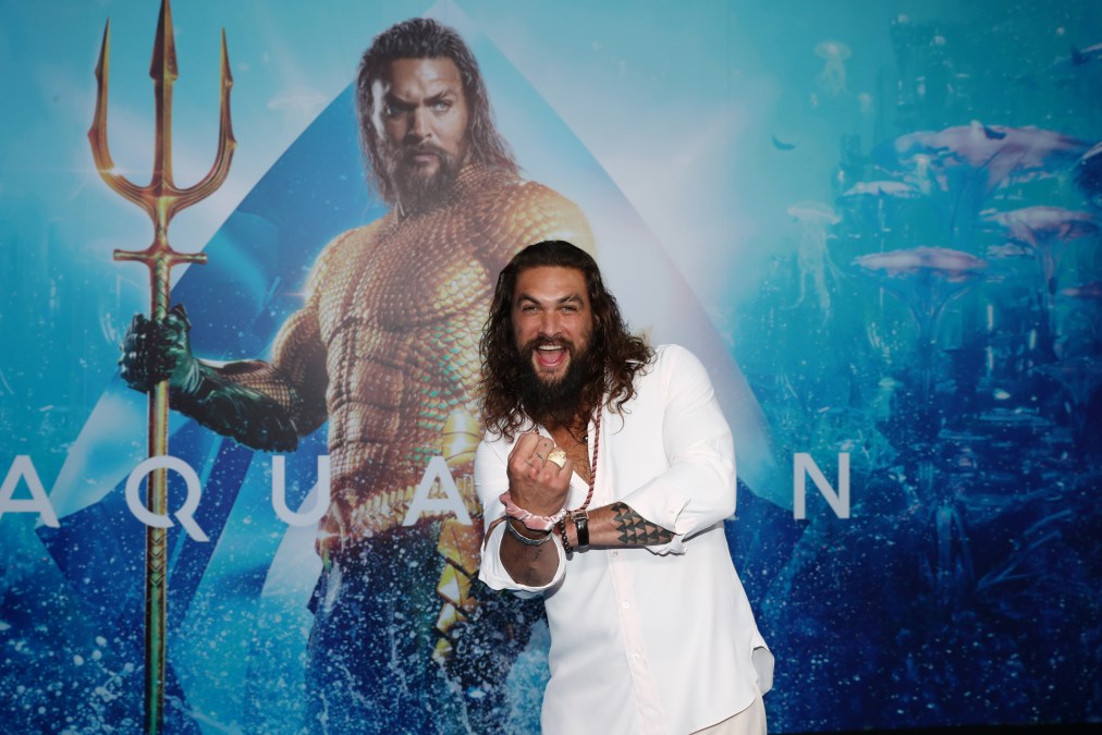Jason Momoa poses at the Australian premiere of Aquaman