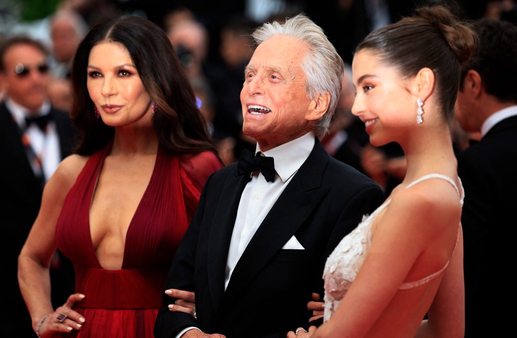 Michael Douglas (C) arrives with his wife British actress Catherine Zeta-Jones
