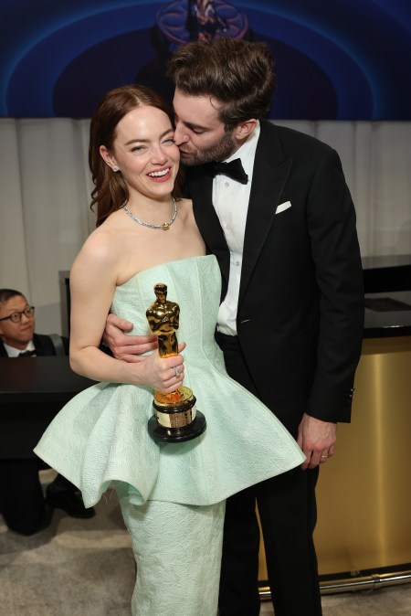 Emma Stone, winner of the Best Actress in a Leading Role award for 'Poor Things,' and Dave McCary 