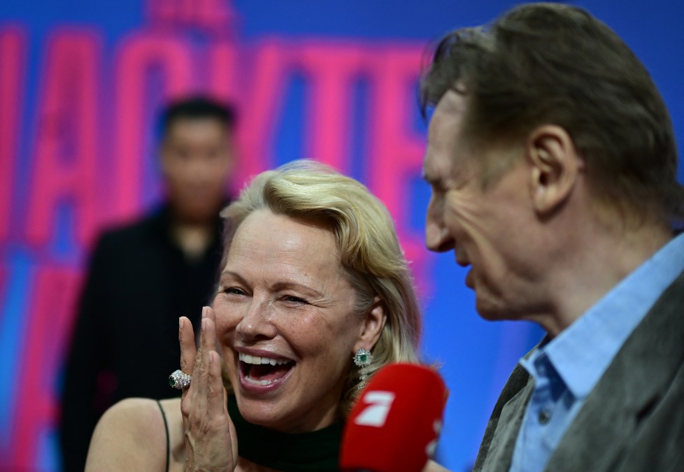 British actor Liam Neeson (R) and Canadian-US actress Pamela Anderson