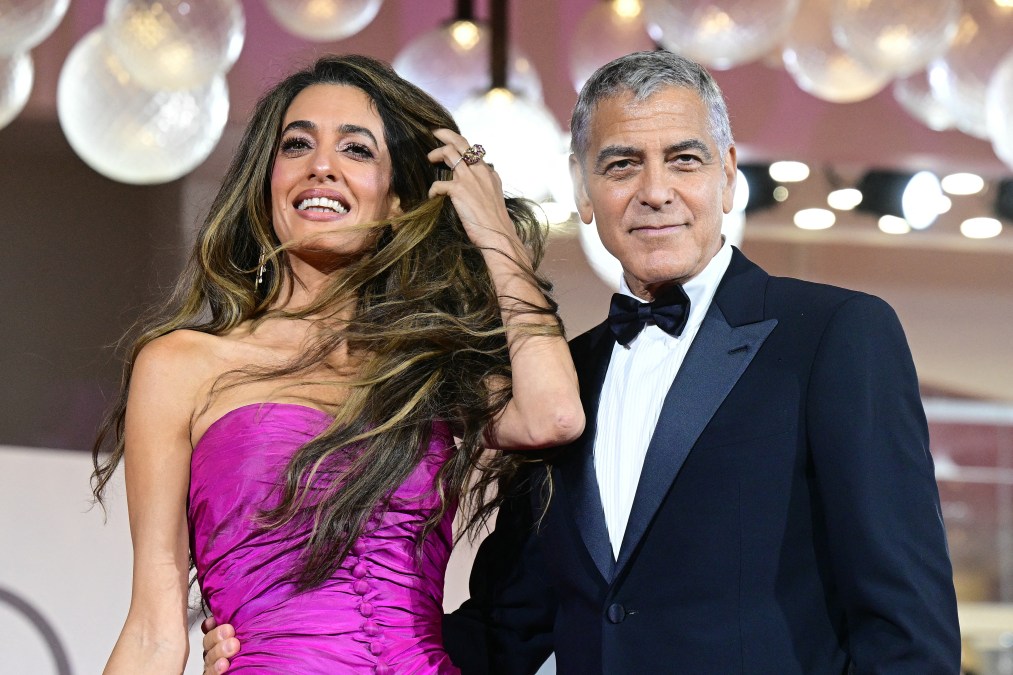 TOPSHOT - US actor George Clooney and his wife Amal Clooney