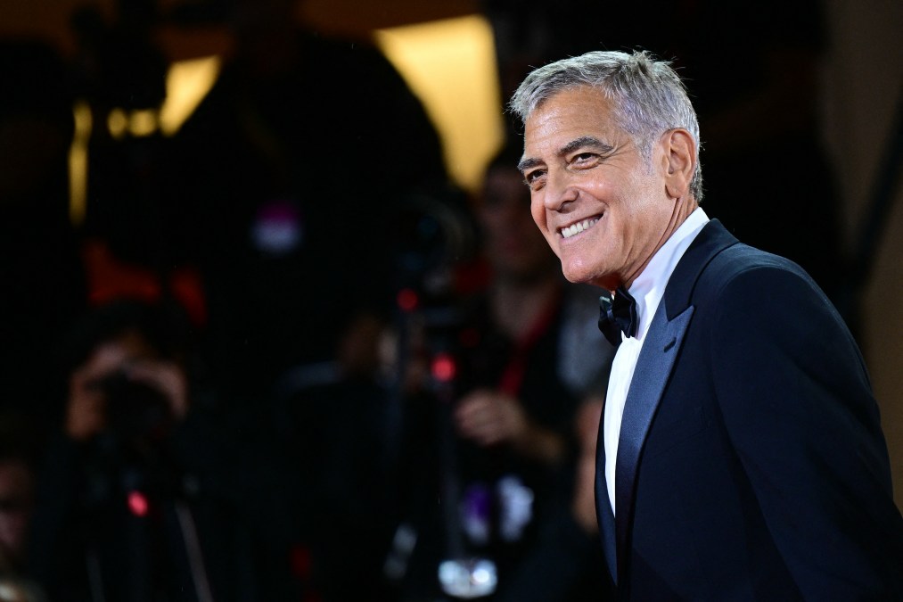 US actor George Clooney walks the red carpet before the screening of the movie "Jay Kelly" presented in competition at the 82nd International Venice Film Festival, at Venice Lido on August 28, 2025. 