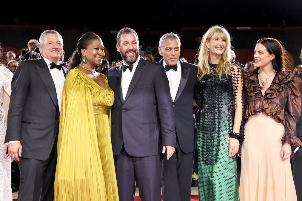 Ted Sarandos, Nicole Avant, Adam Sandler, George Clooney,  Laura Dern and Riley Keough attend the "Jay Kelly" red carpet during the 82nd Venice International Film Festival on August 28, 2025 in Venice, Italy. 