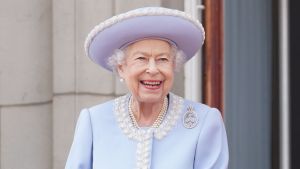 Queen Elizabeth II watches from the balcony of Buckingham Palace during the Trooping the Colour parade the Trooping the Colour parade on June 2, 2022 in London, England