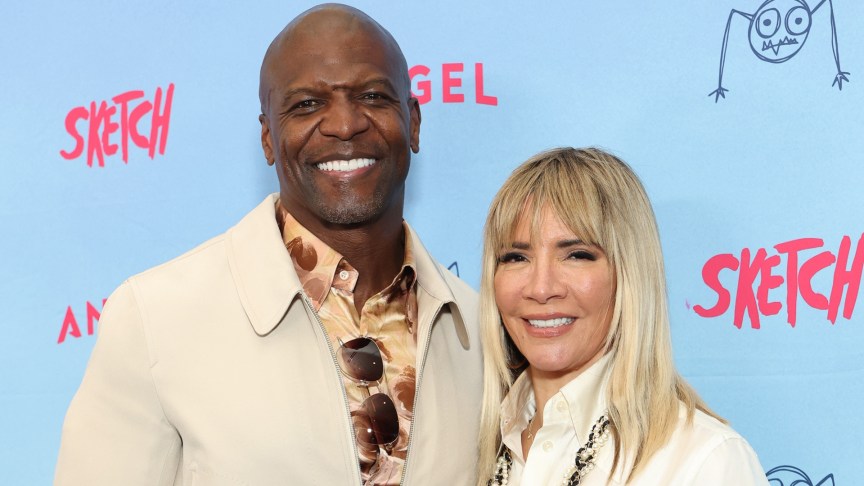 Terry Crews and Rebecca King-Crews smiling