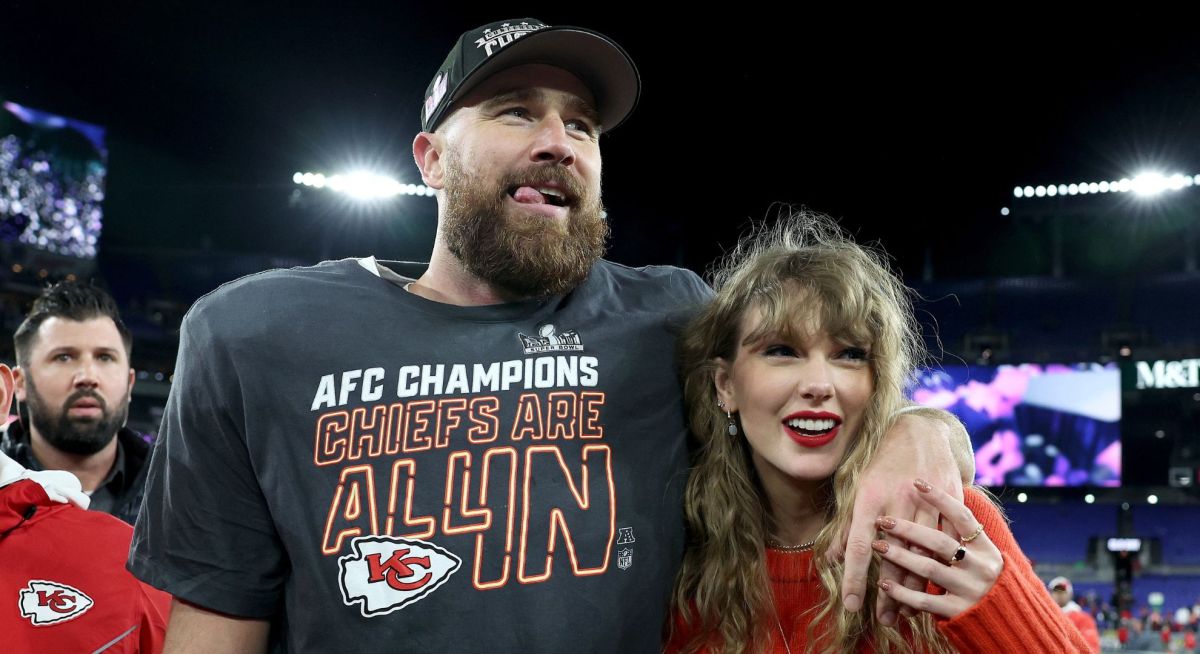 Travis Kelce #87 of the Kansas City Chiefs celebrates with Taylor Swift after a 17-10 victory against the Baltimore Ravens in the AFC Championship Game