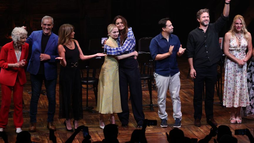 Michelle Williams and Katie Holmes embrace along cast members during the Dawson's Creek Class Reunion at Richard Rodgers Theatre on September 22, 2025 in New York City