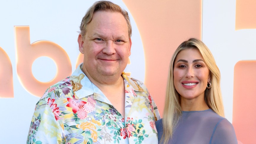 Andy Richter and Emma Slater pose for photo at event