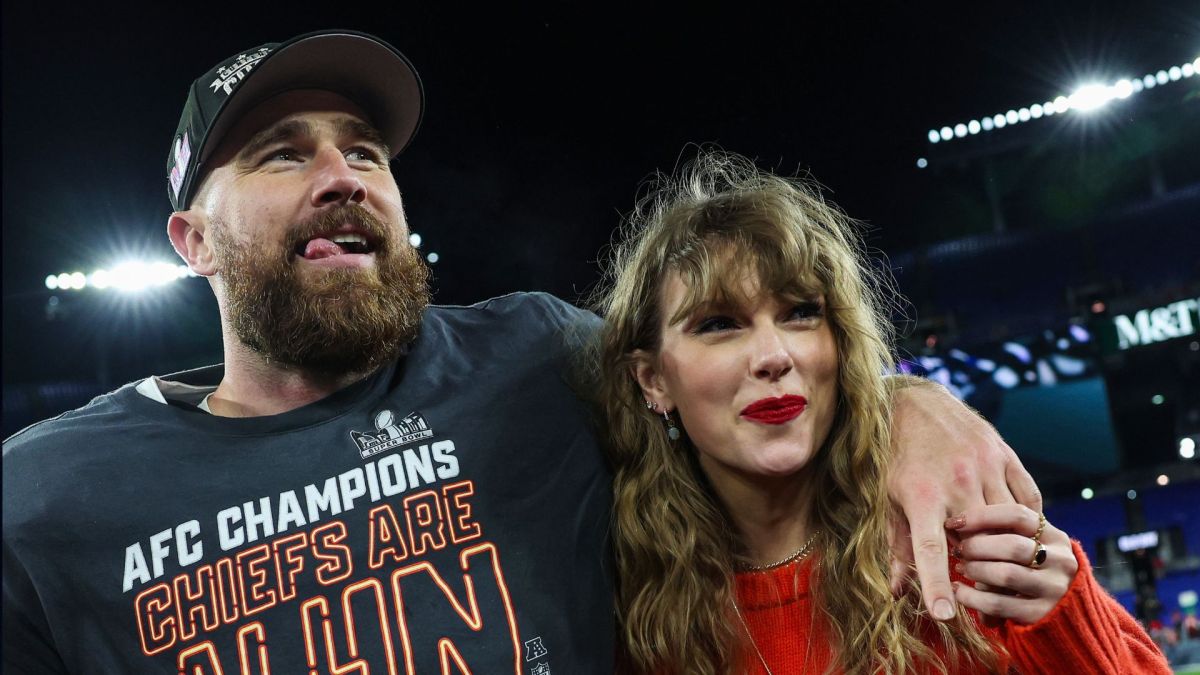 Travis Kelce #87 of the Kansas City Chiefs (L) celebrates with Taylor Swift after defeating the Baltimore Ravens in the AFC Championship Game at M&T Bank Stadium on January 28, 2024