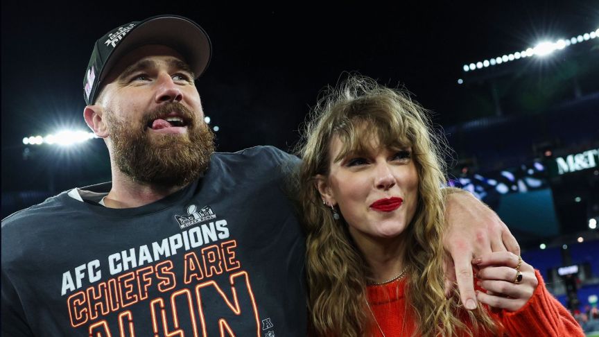 Travis Kelce #87 of the Kansas City Chiefs (L) celebrates with Taylor Swift after defeating the Baltimore Ravens in the AFC Championship Game at M&T Bank Stadium on January 28, 2024