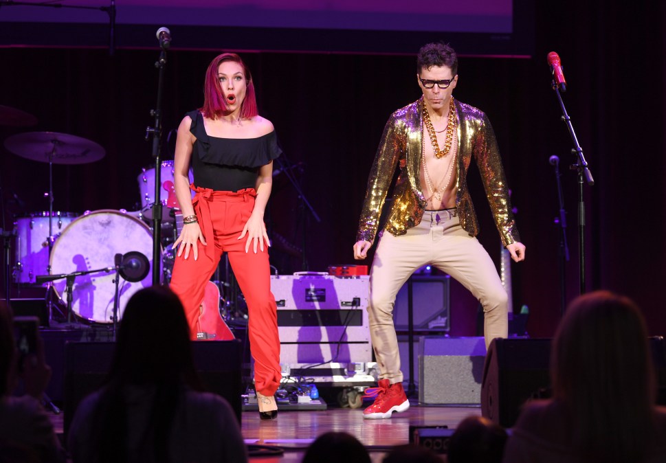 Sharna Burgess and Bobby Bones performing