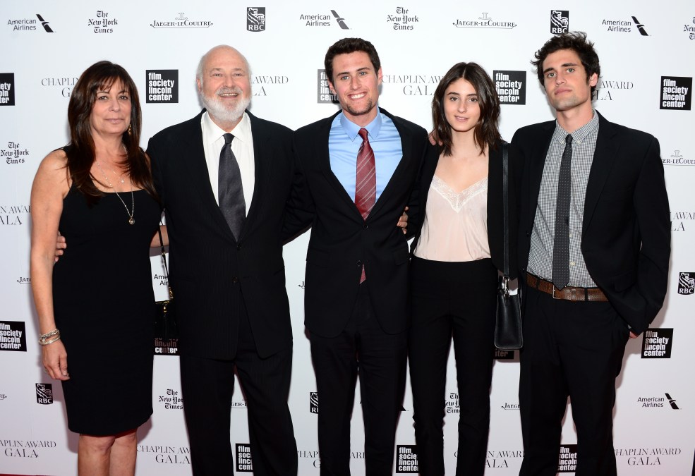 Rob Reiner poses with his wife and three children at an event