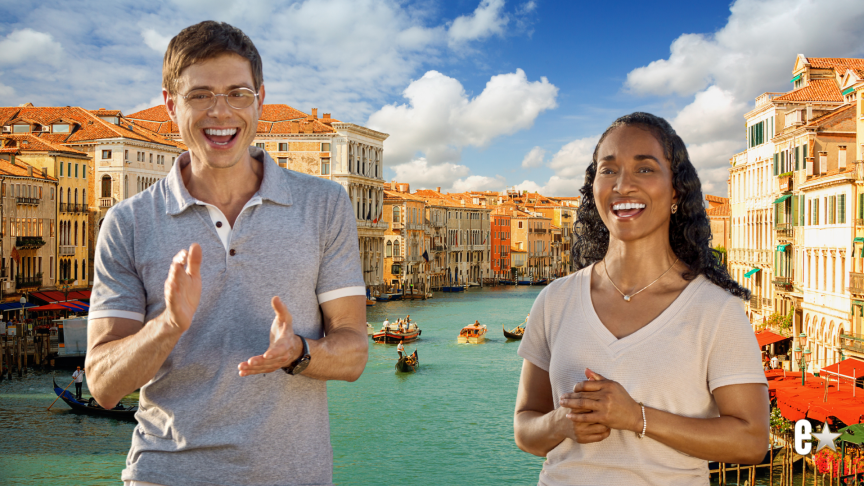 Matthew Lawrence and Chilli smiling in front of water